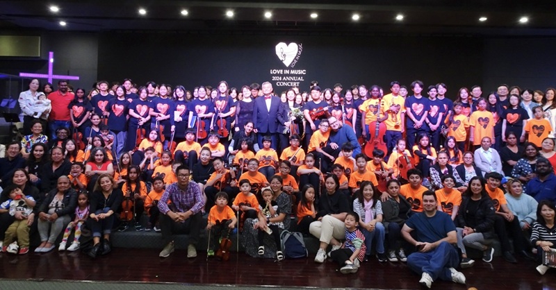 Staff, volunteers and students pose together for group photo after Love in Music held its annual concert at Oriental Mission Church in Los Angeles on the afternoon of June 1, 2024. [Provided by Love in Music]
