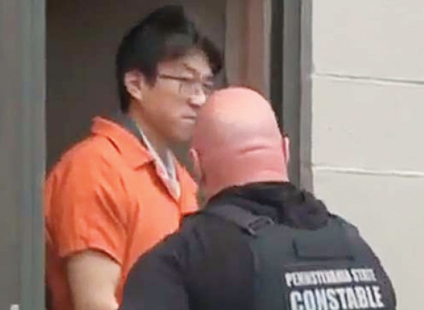 Kevin Hyun Ahn leaves court after preliminary hearing in April in Lancaster County murder case