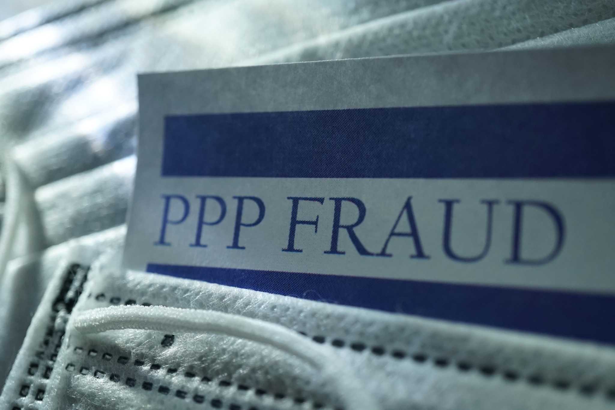 PPP fraud paper symbolizing abuse by Korean American lawyer during pandemic loan program