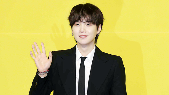 BTS member Suga attends a media conference on May 21, 2021. [JOONGANG ILBO]