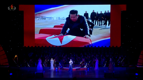 North Korean leader Kim Jong-un sheds tears while in front of a coffin of a soldier who was dispatched to the Kursk region, during a ceremony held on June 29 at the East Pyongyang Grand Theatre in Pyongyang, North Korea. The footage was released by the state television on June 30. [KOREA CENTRAL TV]