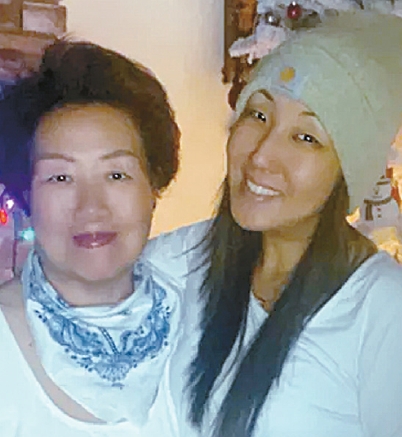 Allison Kim with her mother, victim of Korean American home theft scam