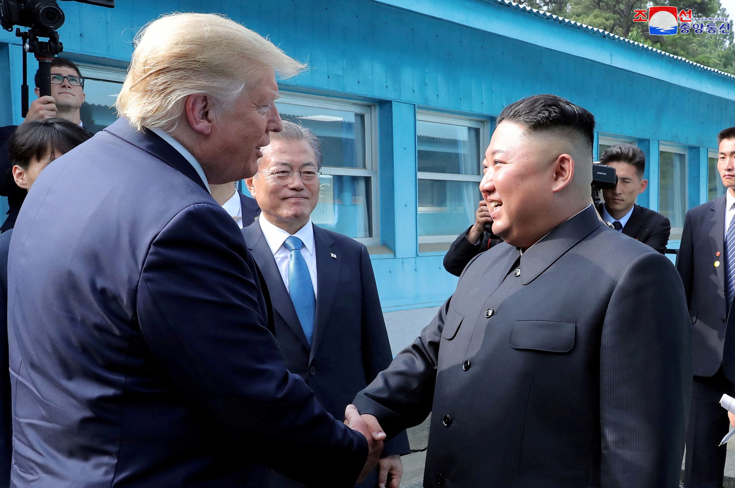 Trump and Kim shake hands at DMZ summit in Panmunjom, South Korea, June 2019