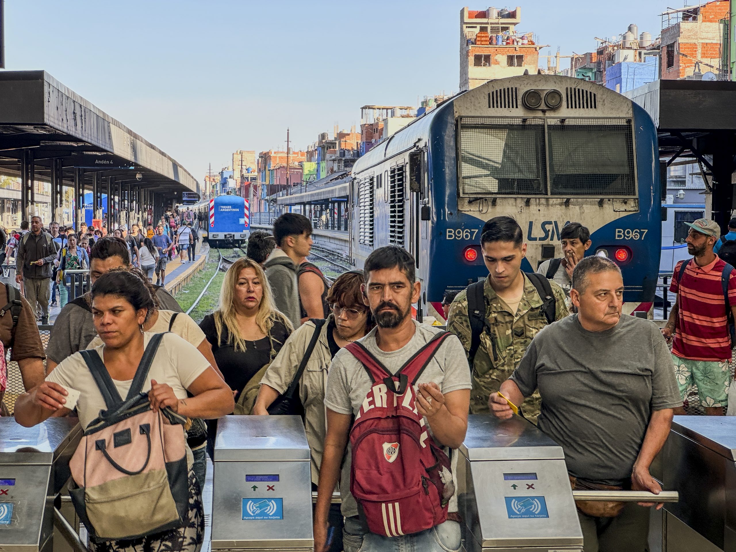Morning rush at Retiro station amid Argentina economic reform era