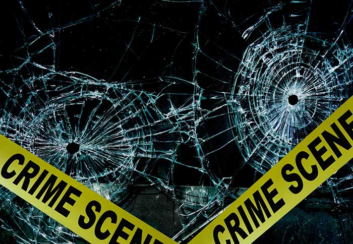 crime scene tape over broken glasses related to Olympic Division police shooting