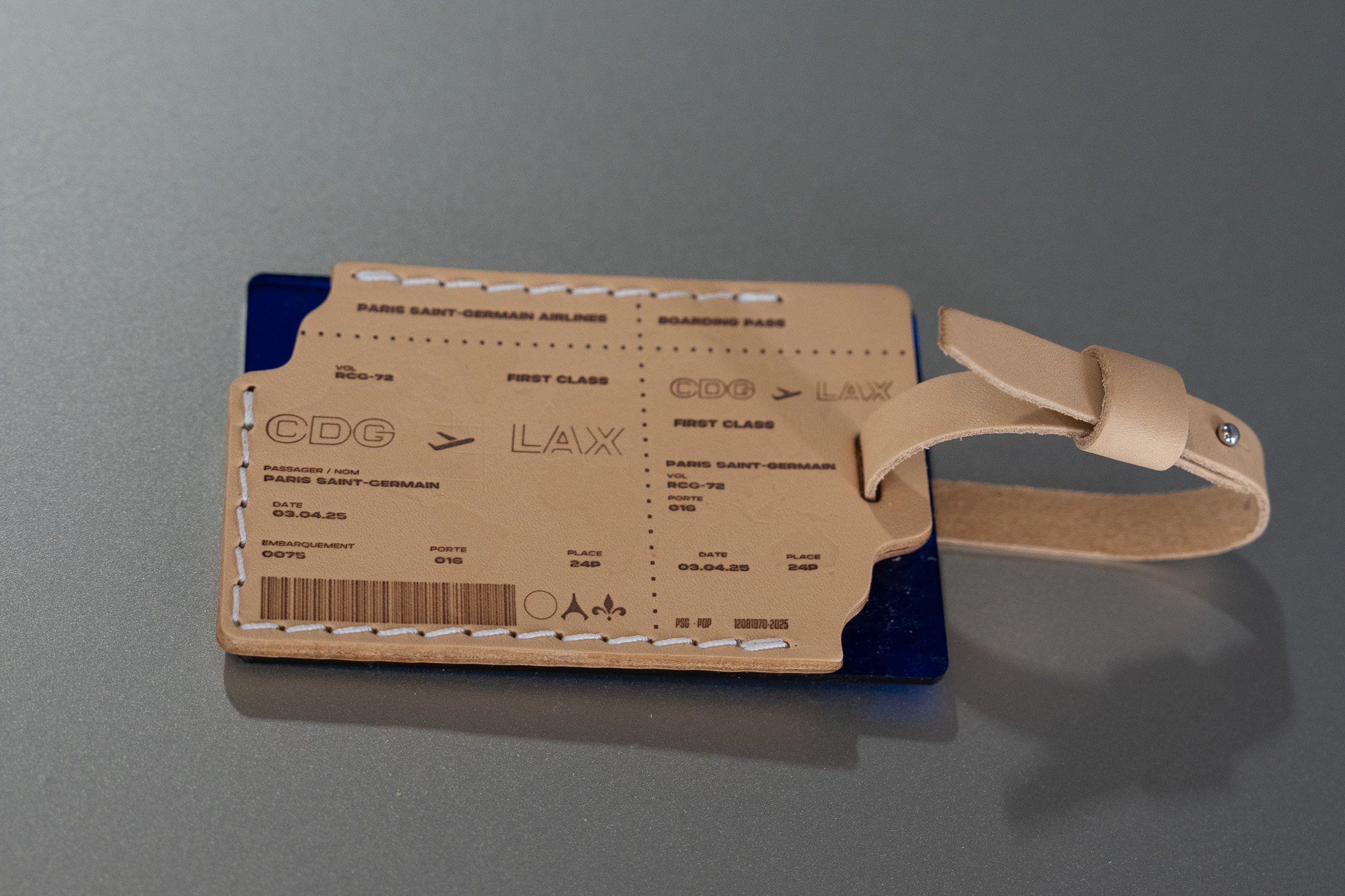 Customized leather tag example from PSG House personalization booth in LA