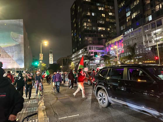 Protesters march past Vermont Avenue during Koreatown ICE protest