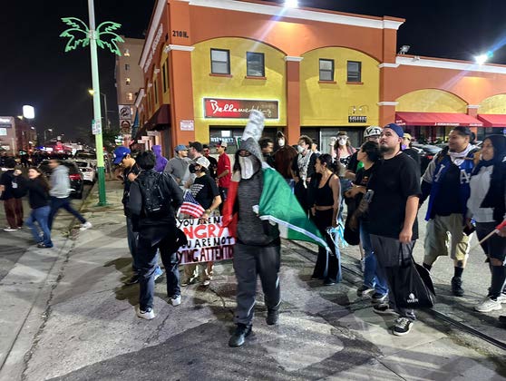 Koreatown ICE protest crowd moves north on Western Avenue