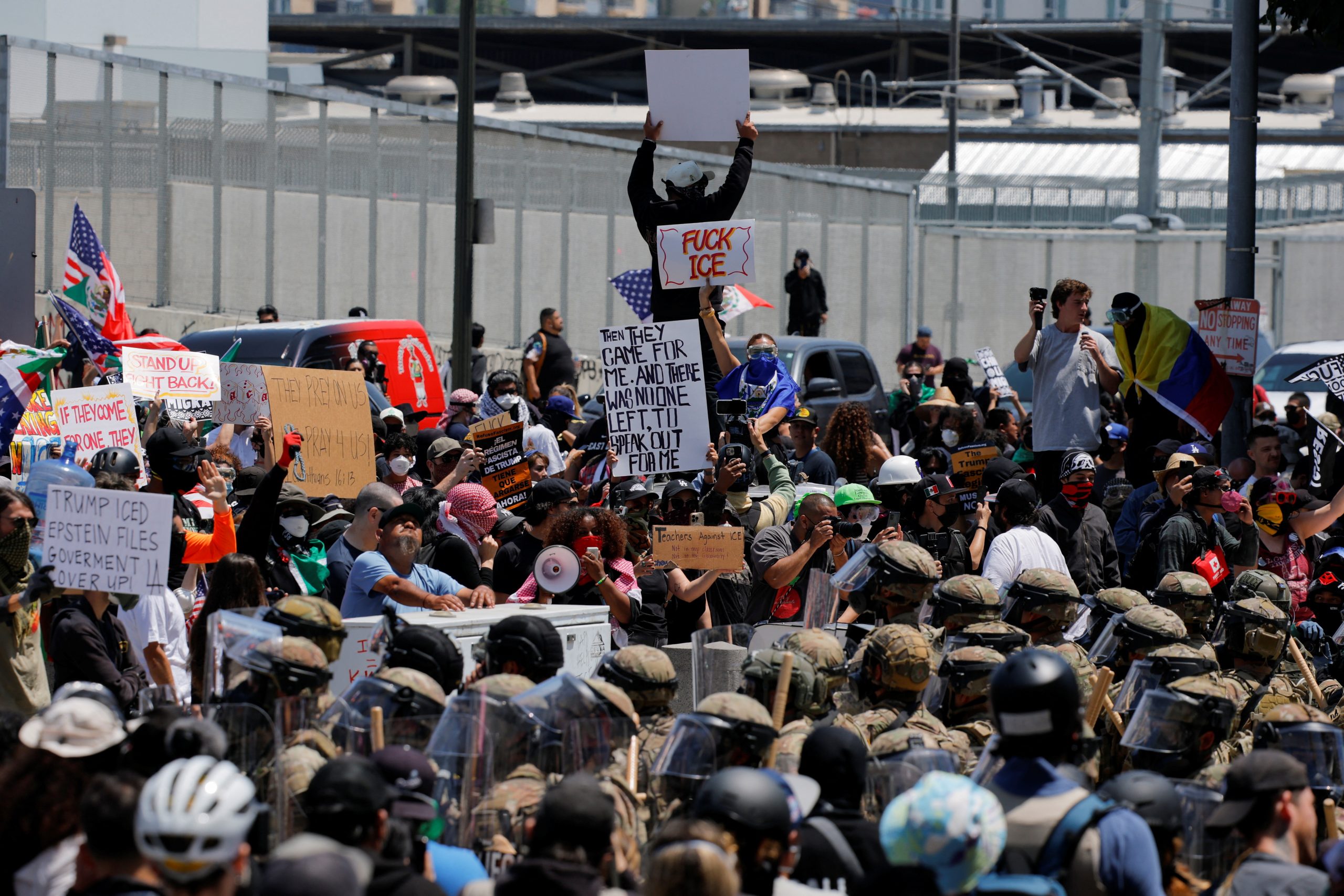 Demonstrators protest ICE raids as California National Guard stands outside Roybal federal building in Los Angeles