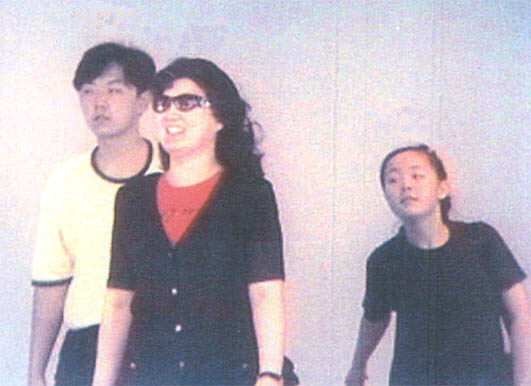 Ko Yong-hui, the late mother of North Korean leader Kim Jong-un, is pictured with son Kim Jong-chul and daughter Kim Yo-jong. [BUNGEI SHUNJU]