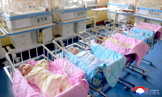 Quintuplets, three girls and two boys, born to mother Pak Kyong-sim and her husband, Son Chung-hyo, are seen at a maternity clinic in Pyongyang, in this undated photo released by North Korea's official Korean Central News Agency on June 20. [YONHAP]