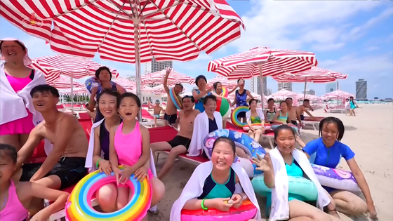 This image of tourists at the Kalma coastal tourist zone in Wonsan was captured from Korean Central Television on July 16. [YONHAP]