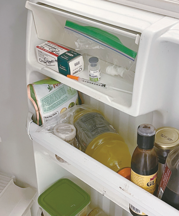 Fridge with syringes highlighting nonprofit clinic botox filler allegations