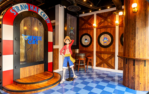 Inside view of One Piece Cafe Los Angeles with anime-themed decor and seating