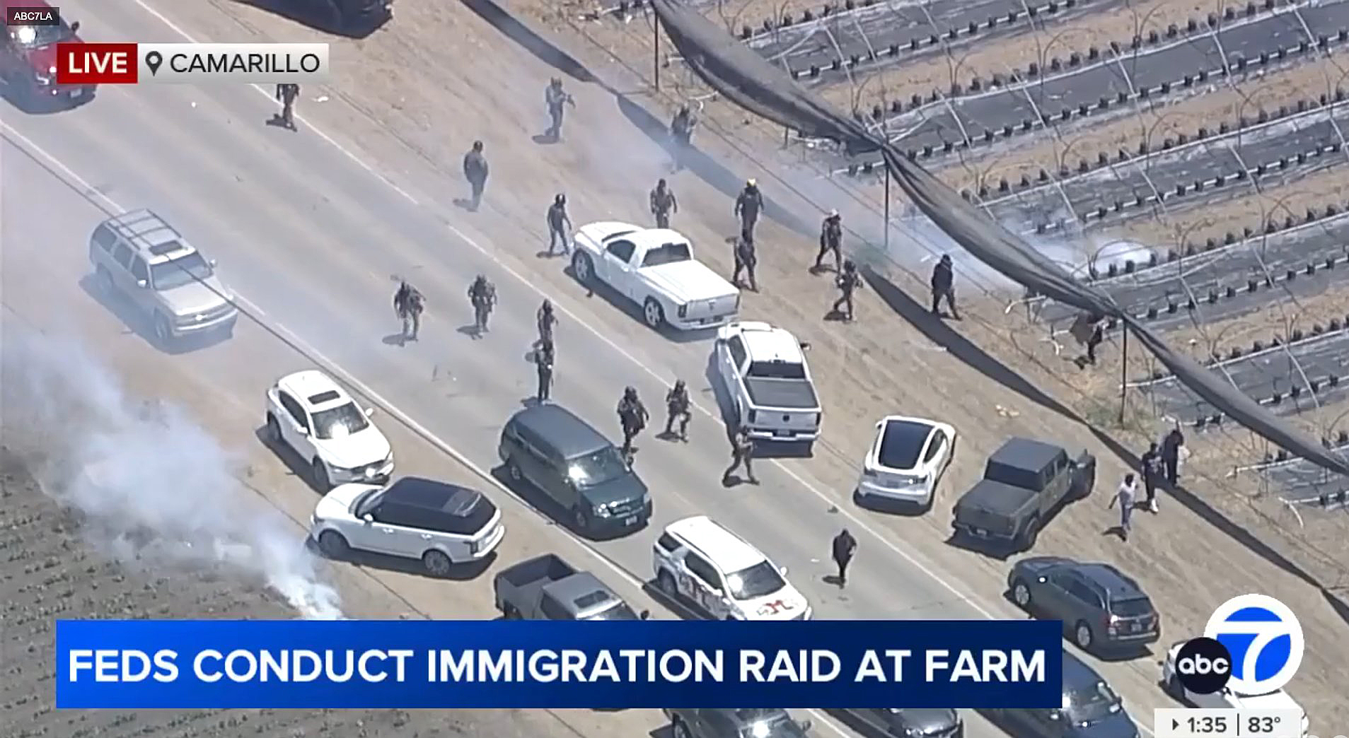 Ventura County ICE raid scene with tear gas cloud visible, screenshot aerial
