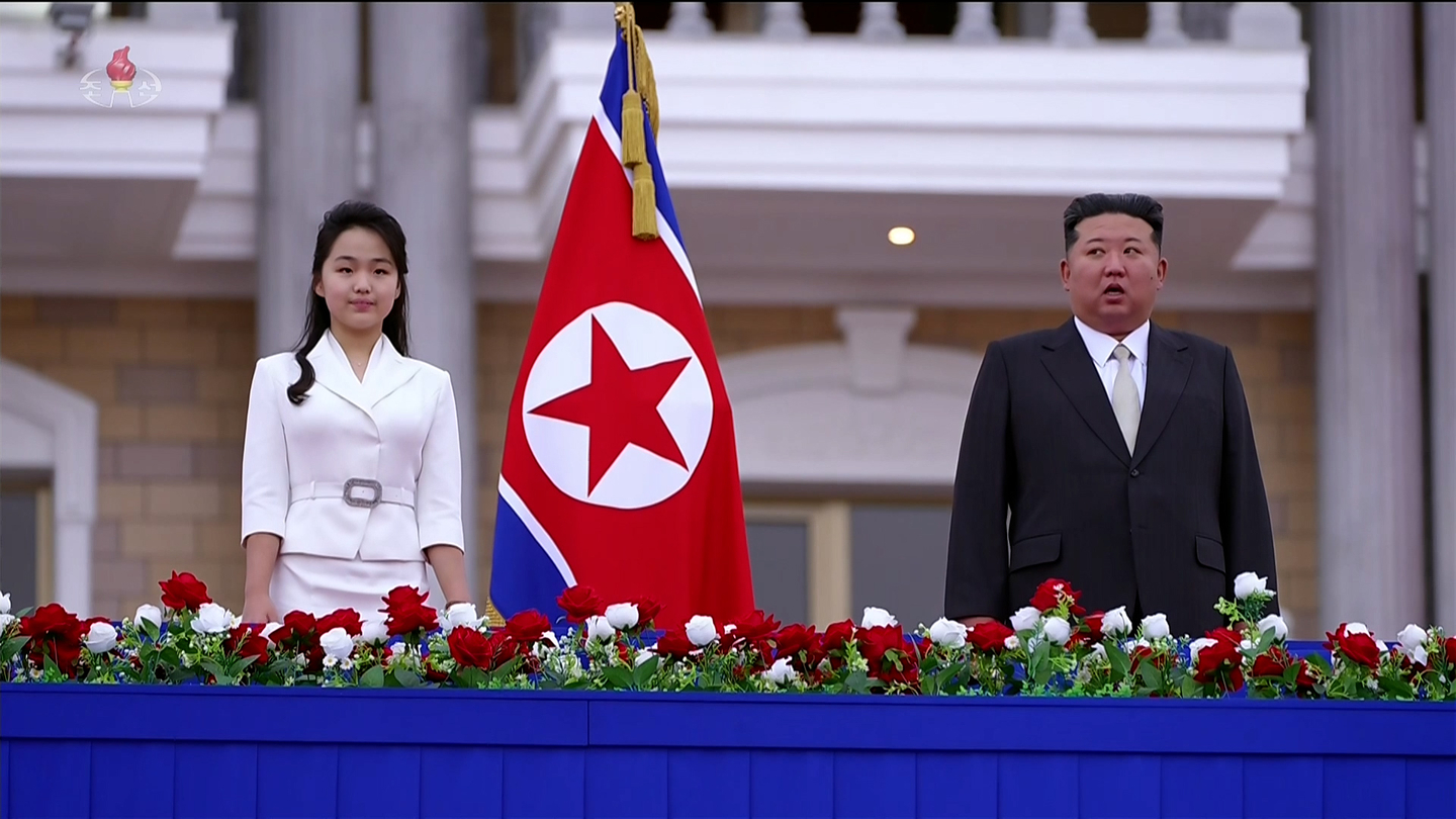 North Korean leader Kim Jong-un and his daughter, Ju-ae, attend the inauguration ceremony for the Wonsan-Kalma coastal tourist zone on June 24 in this image provided by the state-run Korean Central Television on June 26. [KOREAN CENTRAL TELEVISION]