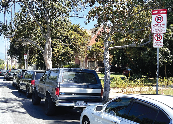 LA Koreatown parking shortage street with no parking 2–6 a.m. sign in Country Club Park