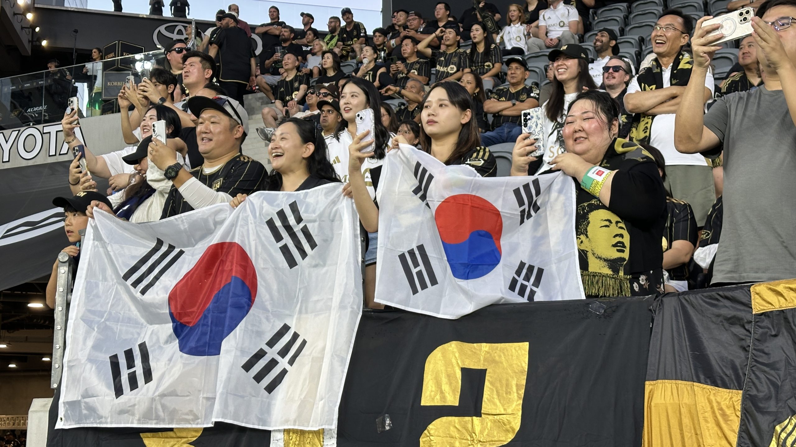 Korean American fans wave Taegeukgi during Son Heung-Min LAFC home debut at BMO Stadium