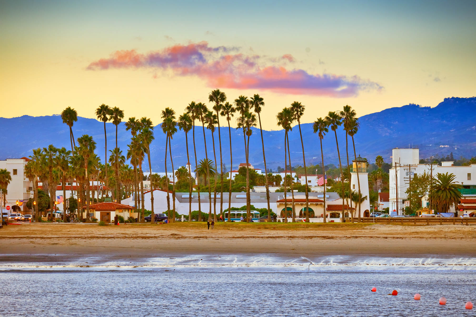 Santa Barbara coastline view from Stearns Wharf pier with city and mountains in the background
