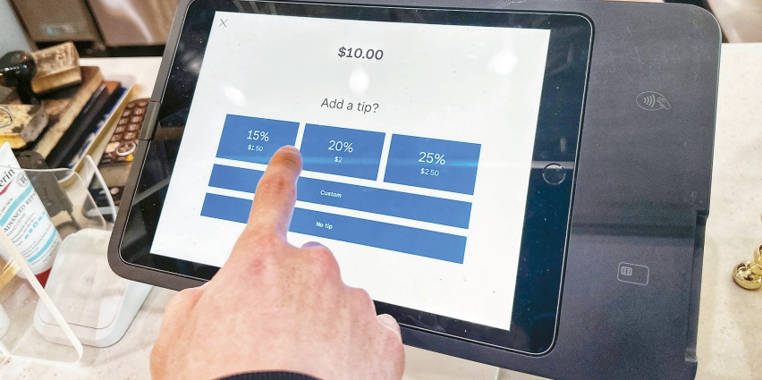 Self-checkout kiosks expanding to airports and stadiums increase consumers’ tipping pressure in contactless services amid LA Koreatown bakery tipping dispute.