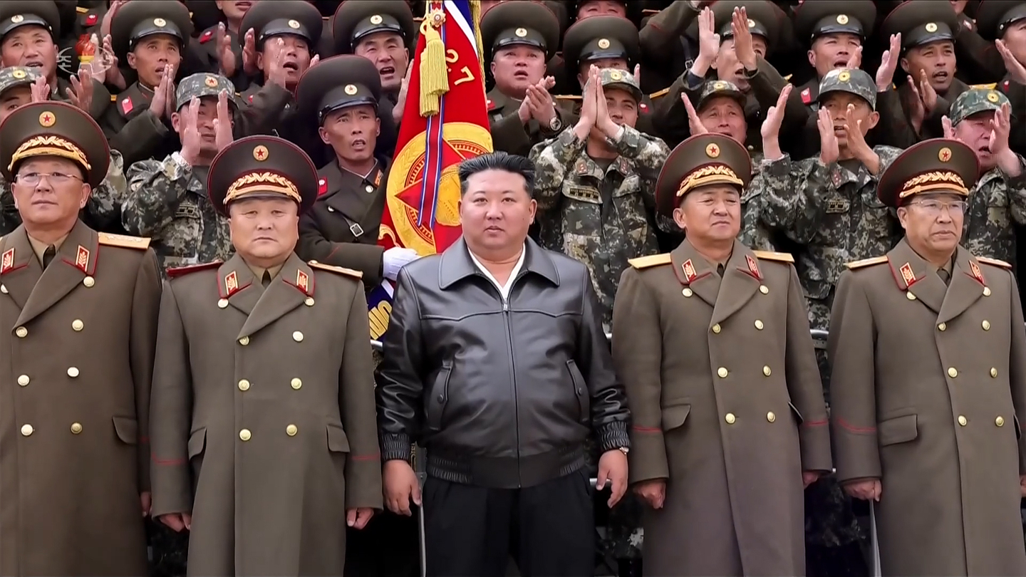 North Korean leader Kim Jong-un visits the command of the Korean People’s Army 11th Corps on Nov. 1, according to Korean Central Television on Nov. 2. Kim is seen posing for a commemorative photo. [KOREAN CENTRAL TELEVISION]