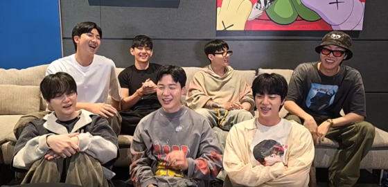 Boy band BTS appears in a Weverse livestream on July 1, 2025. [SCREEN CAPTURE]