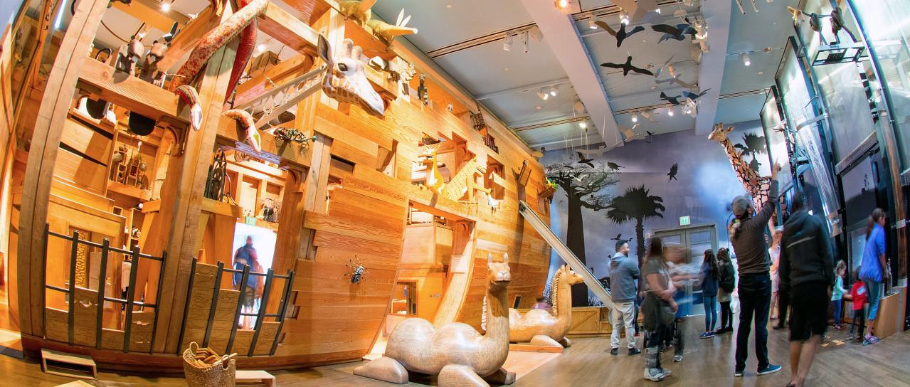 Noah’s Ark exhibit storm gallery at the Skirball Cultural Center with immersive lighting and animal figures
