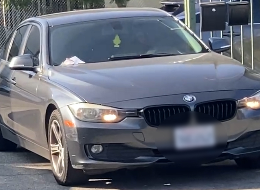 The gray BMW the suspect was driving. [Courtesy of Pastor Shin]