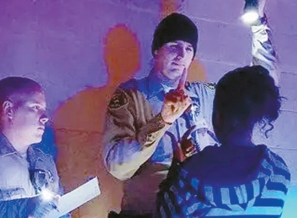 Deputies from the Los Angeles County Sheriff’s Department (LASD) conduct a sobriety test. [Facebook capture]