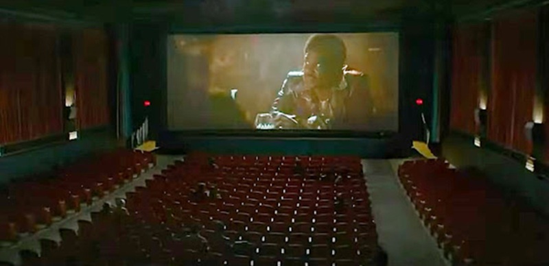 An interior scene of the theater used in the trailer for The Adventures of Cliff Booth. [Capture from movie clip]