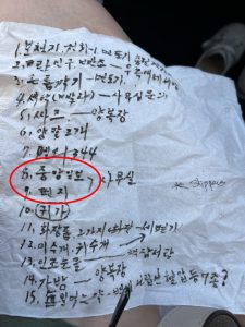 Korean War veteran newspaper reader