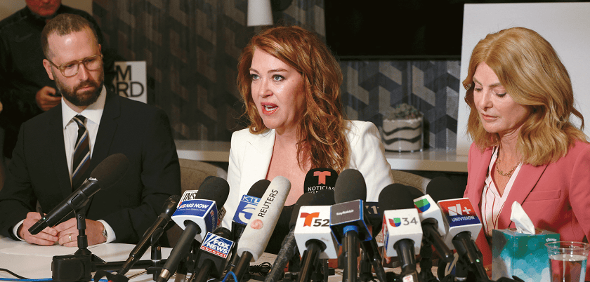 Lonna Drewes (center) holds a press conference with attorneys, alleging sexual assault by former Rep. Eric Swalwell.