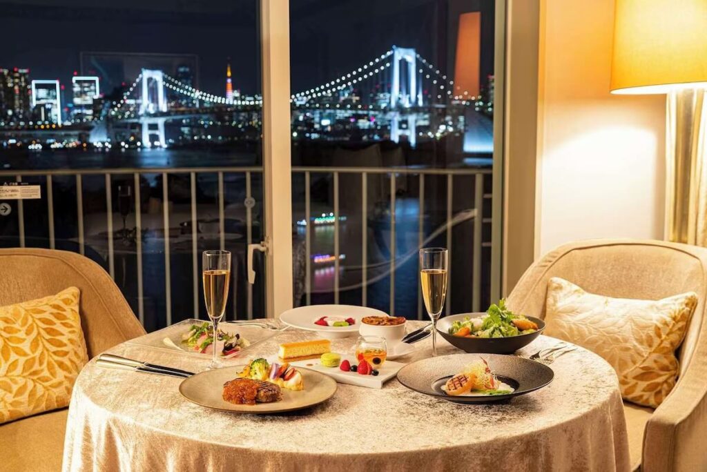 Romantic dinner with Rainbow Bridge night view from Hilton Tokyo Odaiba featured in the Tokyo Family Itinerary