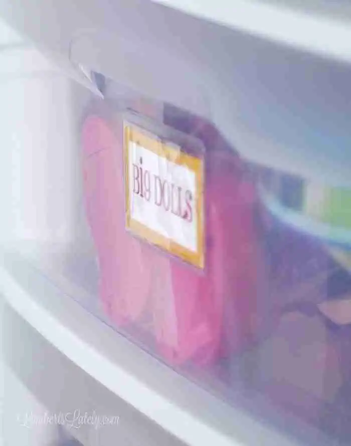 label on the front of a plastic bin.
