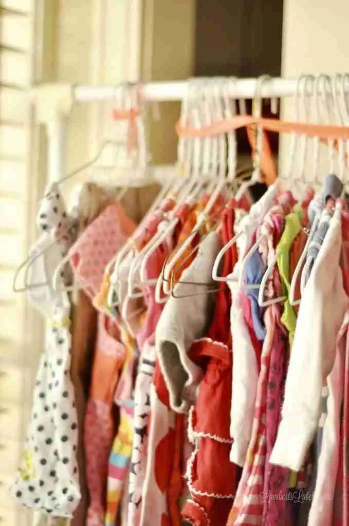 children's clothing on a rack.