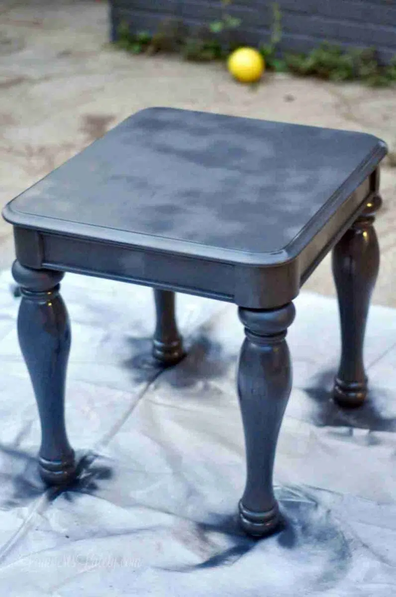 table on a tarp, just spray painted gray.