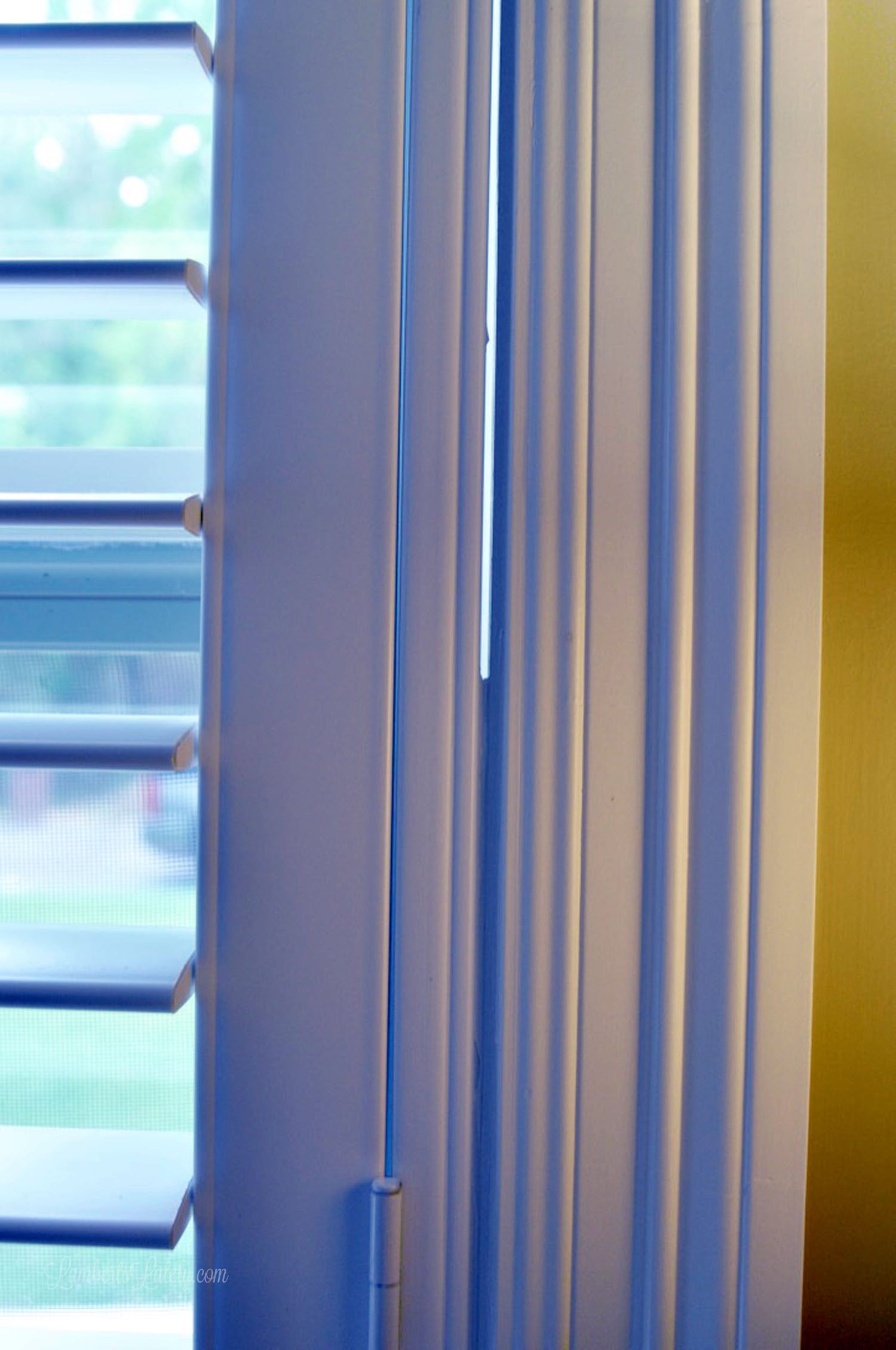 half of gap between frame and window caulked.