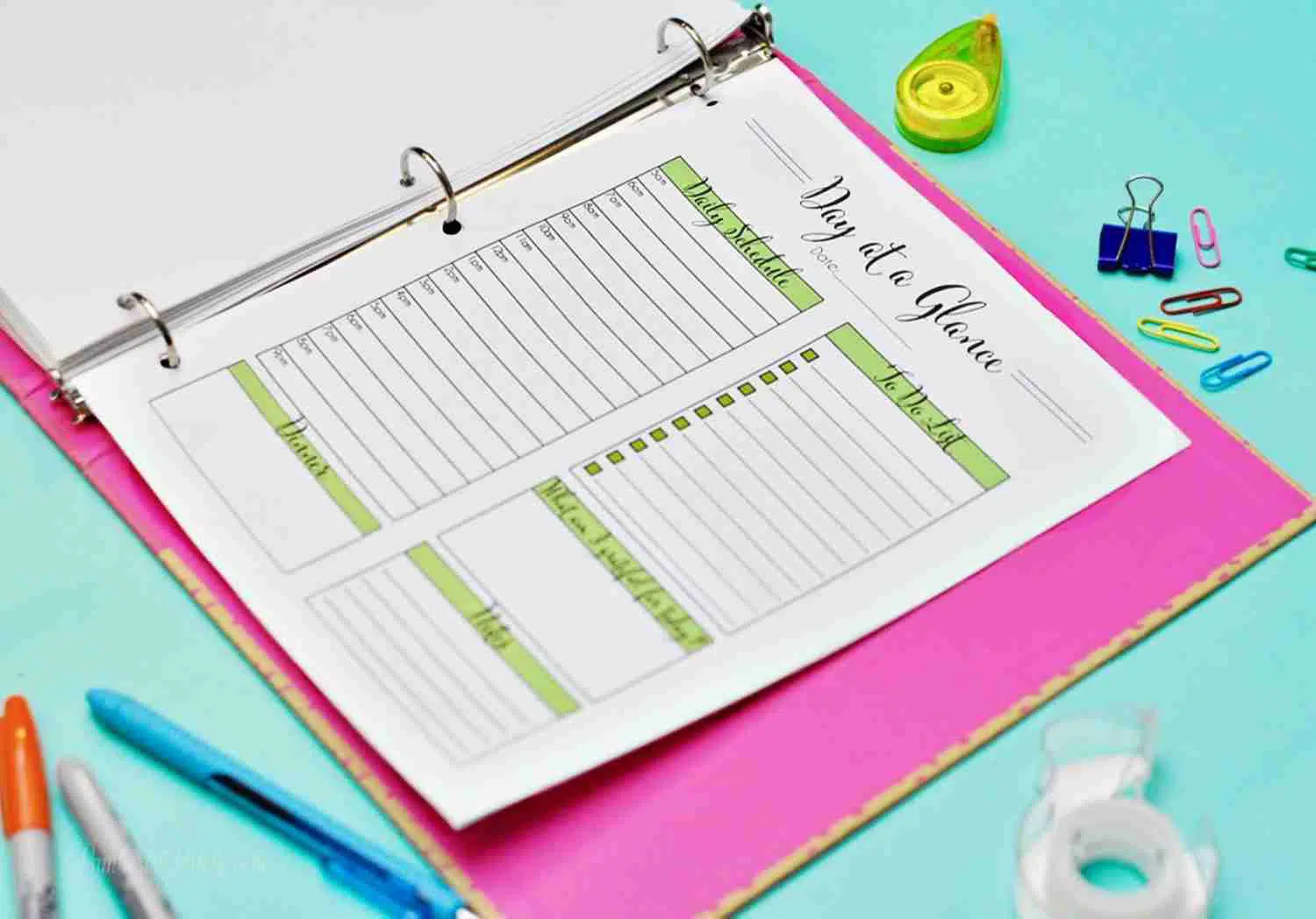 day at a glance printable in a notebook.