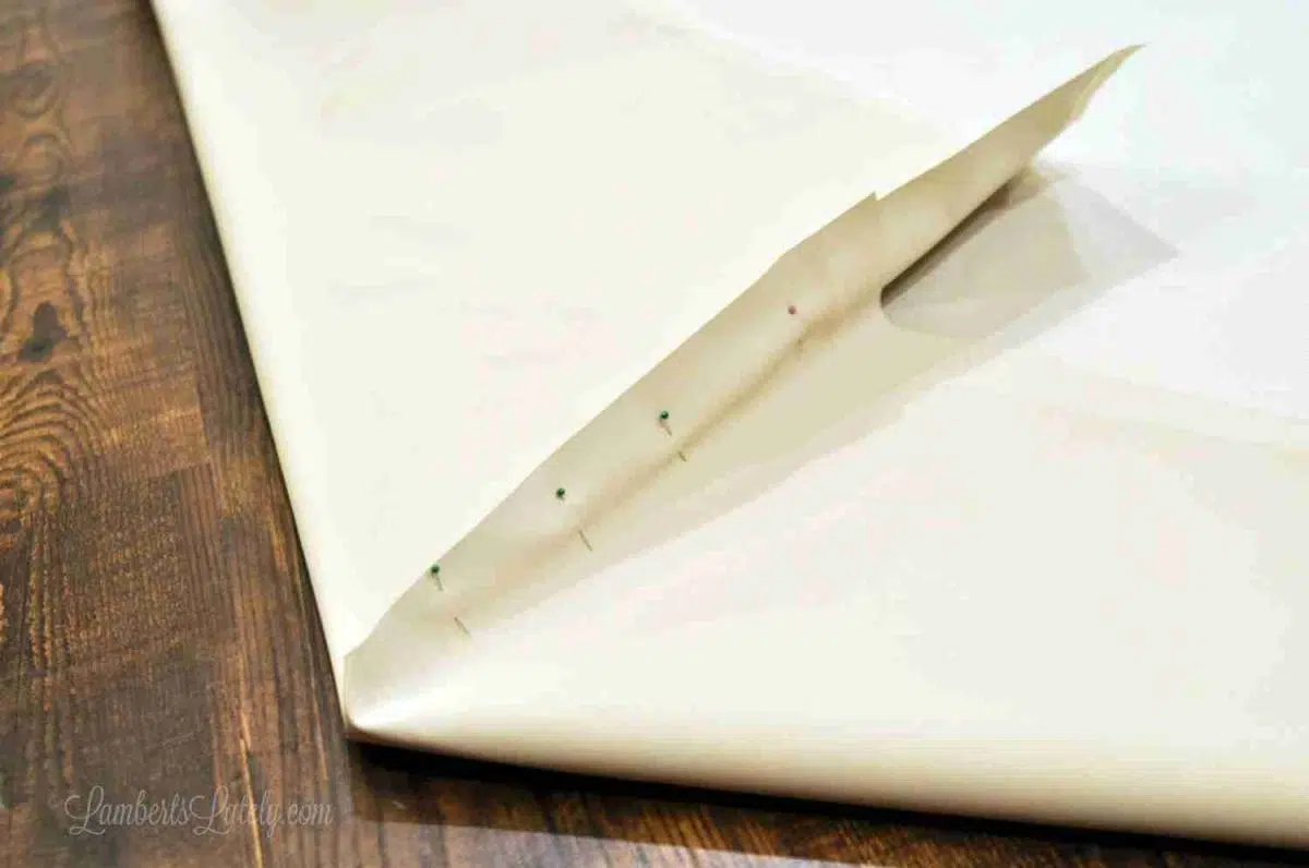 exterior fabric folded at corners for mattress cover