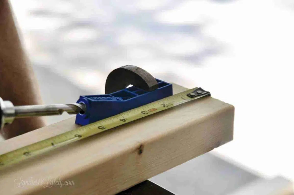 drilling a hole into a 2x4