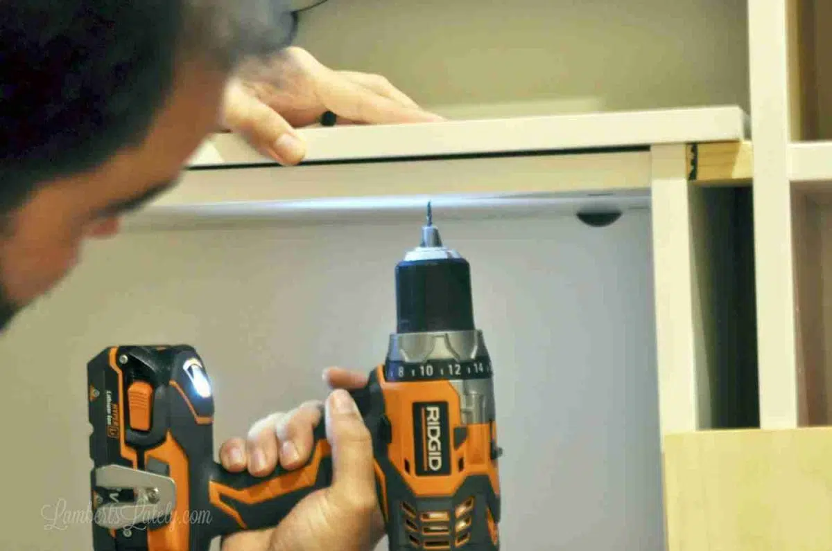 drilling in top of cabinet.
