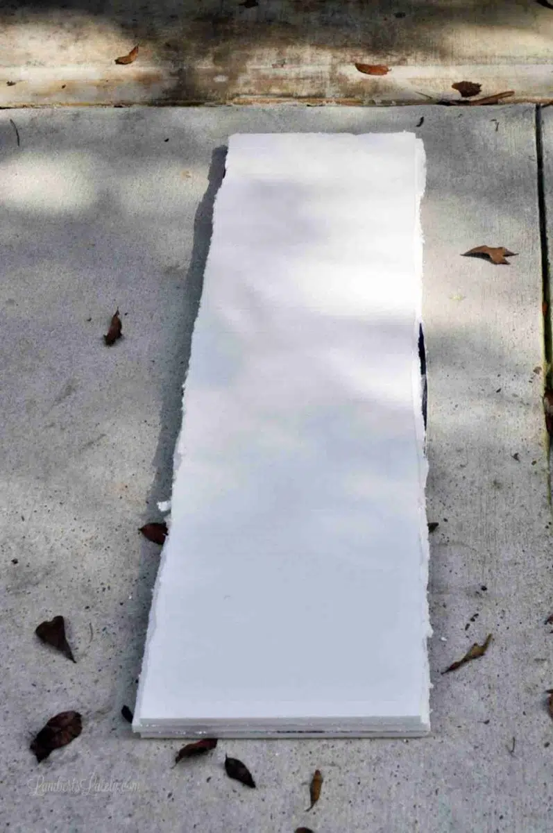 long rectangular piece of foam board.