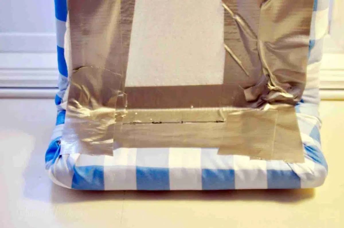 back of cornice board, with fabric duct taped in place.