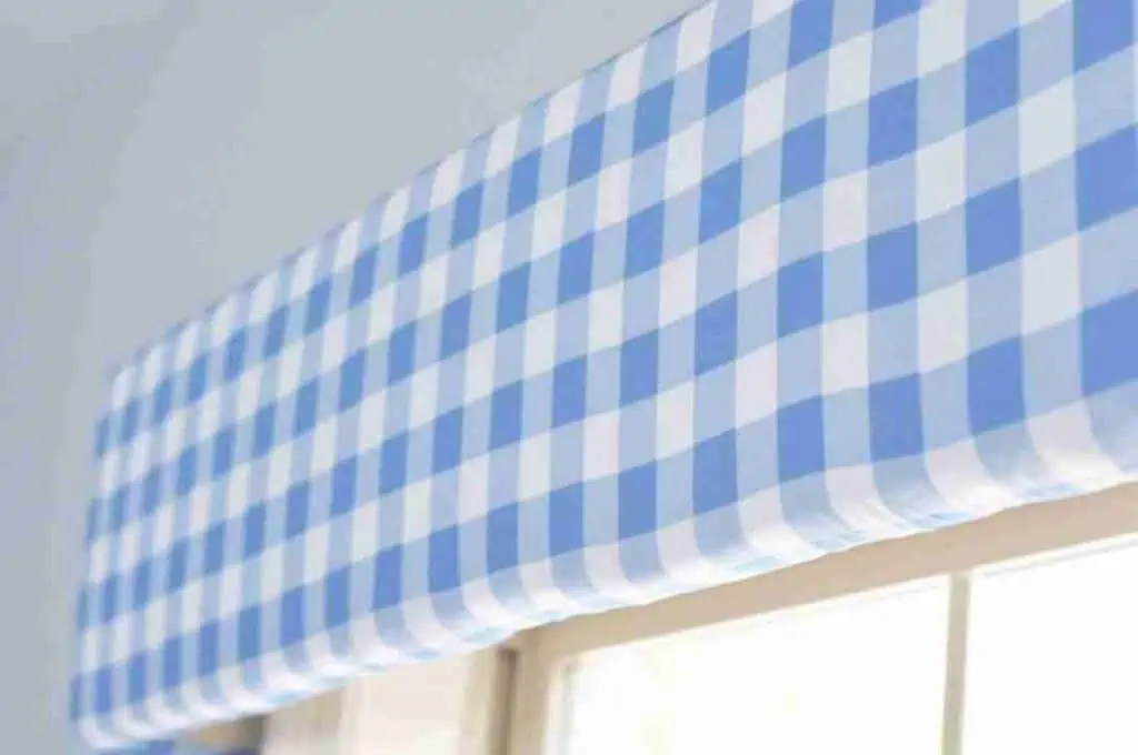 blue gingham cornice board on a window.