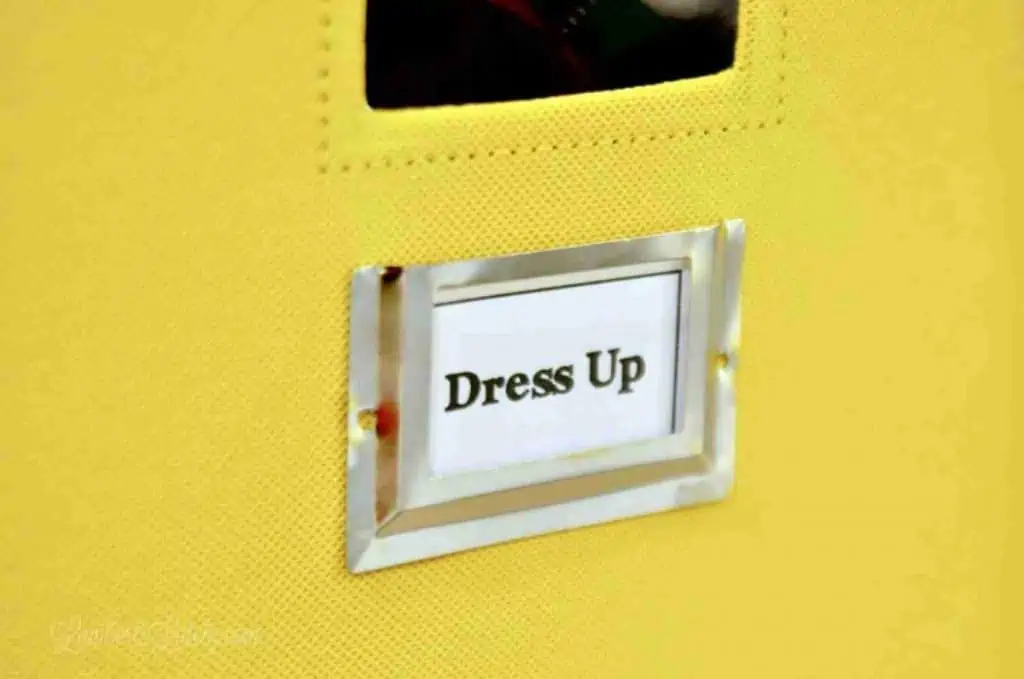 label on a yellow fabric bin.