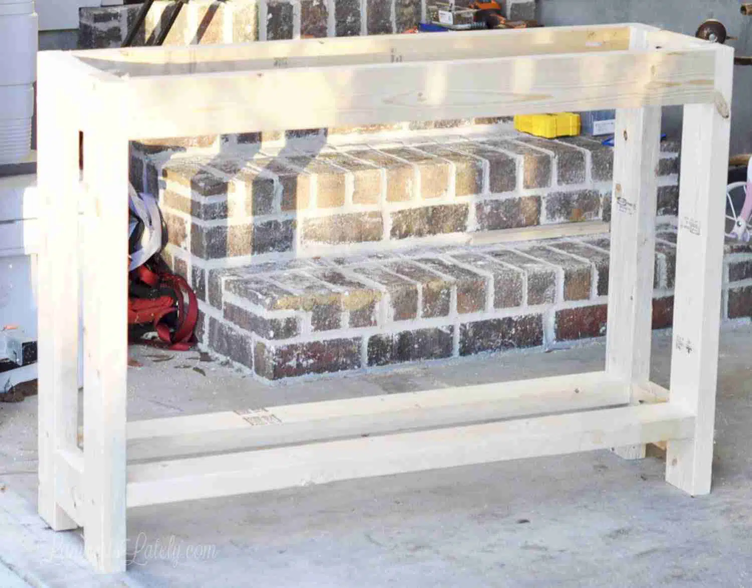 table without top or bottom shelf slats.
