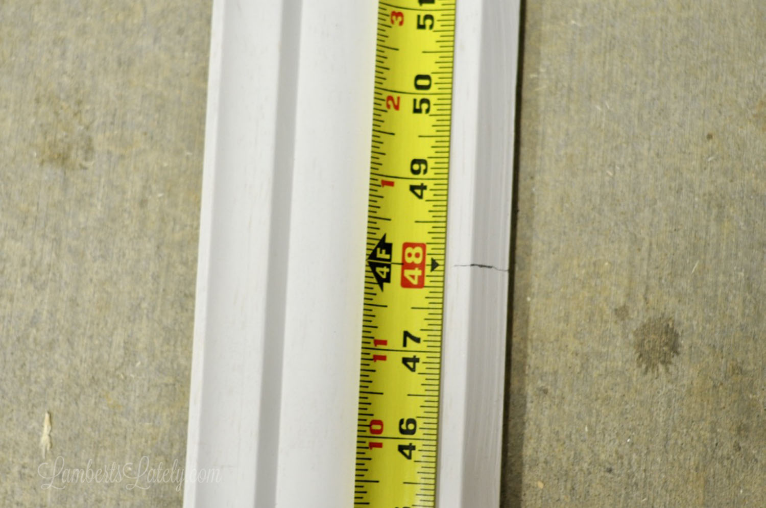 measuring molding with measuring tape.