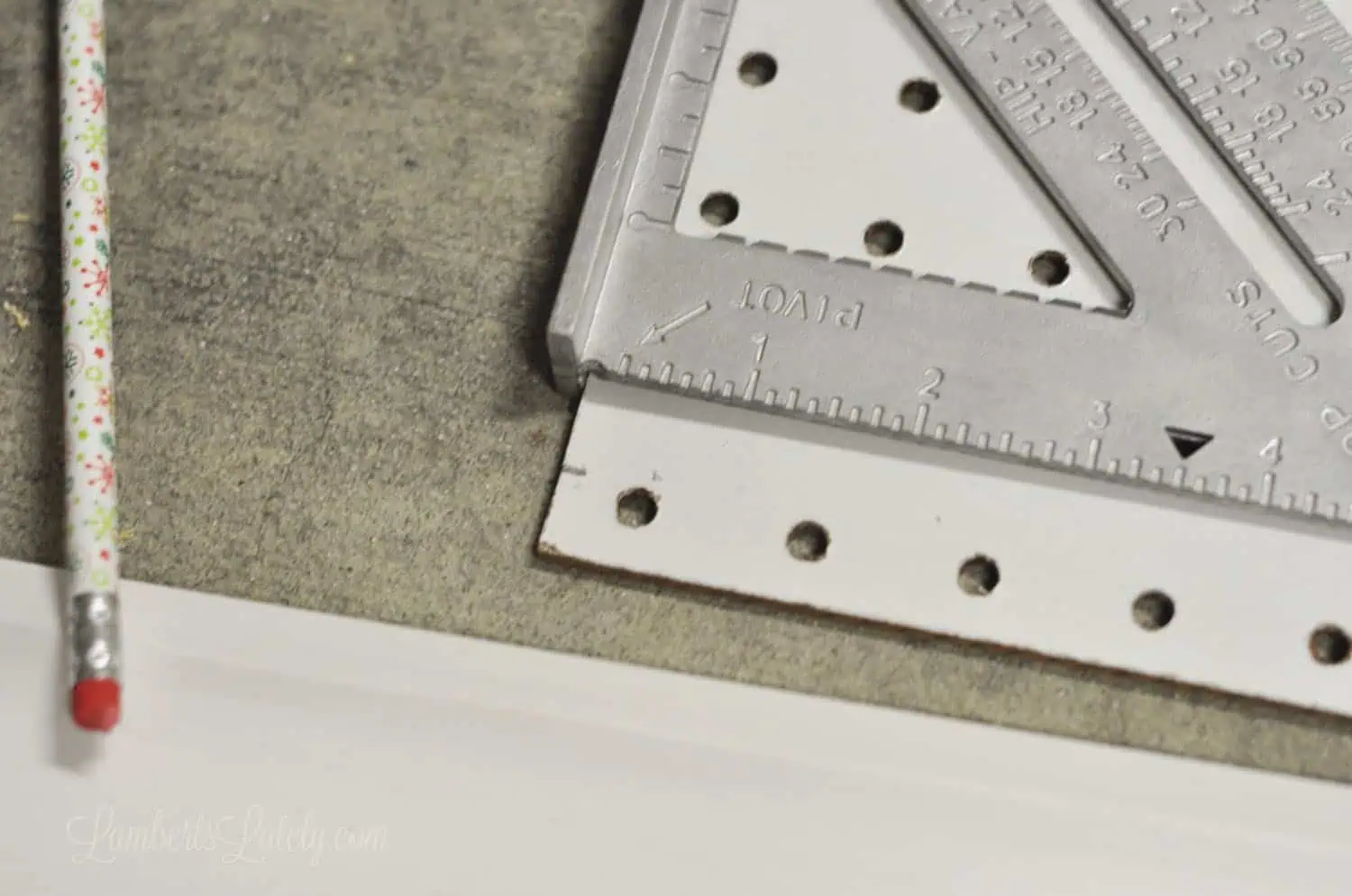 marked ½" line on a pegboard.