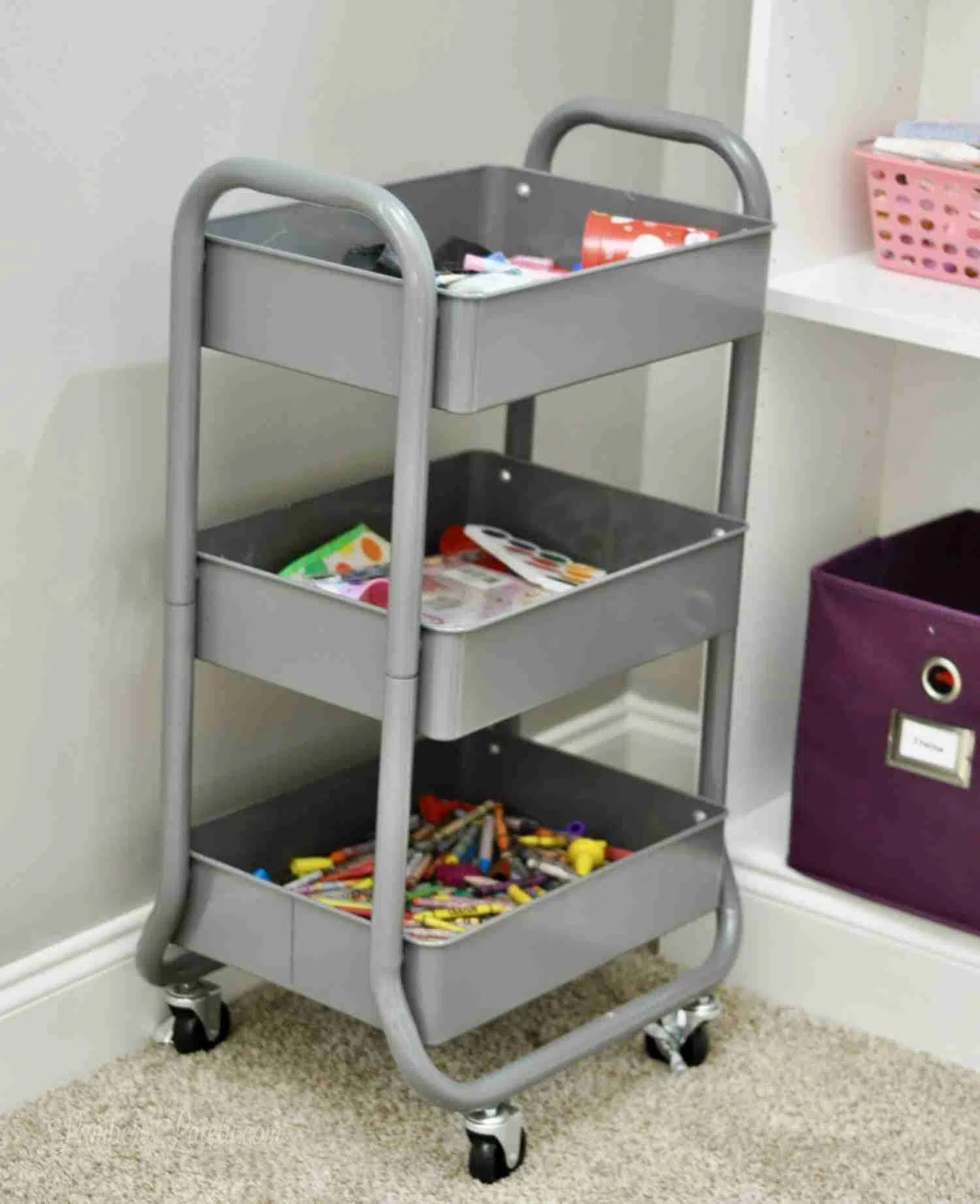 gray metal rolling cart organizing art supplies