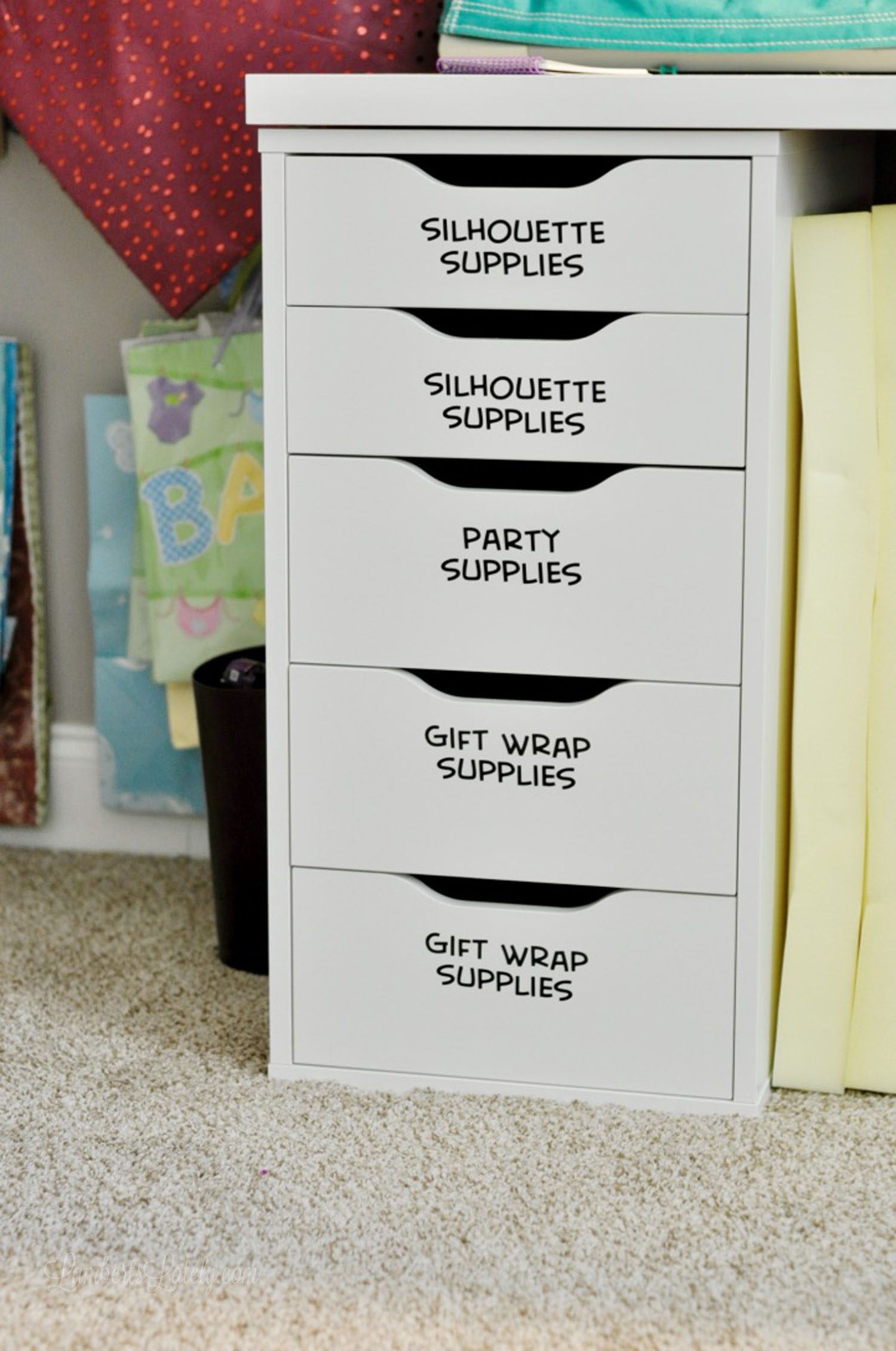 labeled drawers on an ikea desk